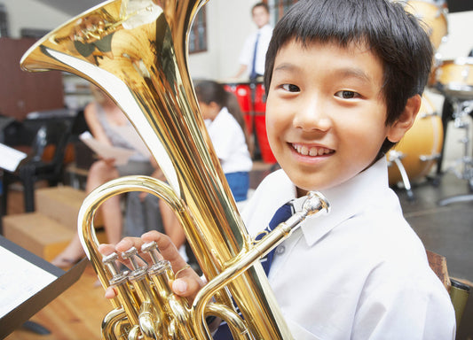 Boy playing baritone