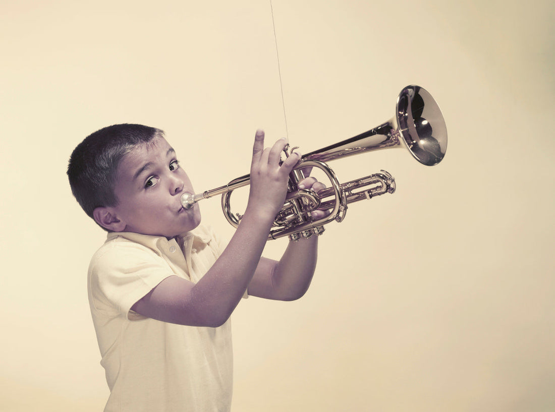 Boy Playing a Trumpet