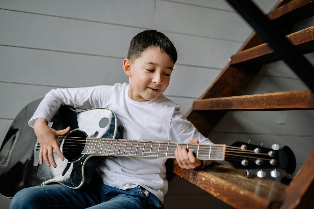 Boy Playing Acoustic Guitar