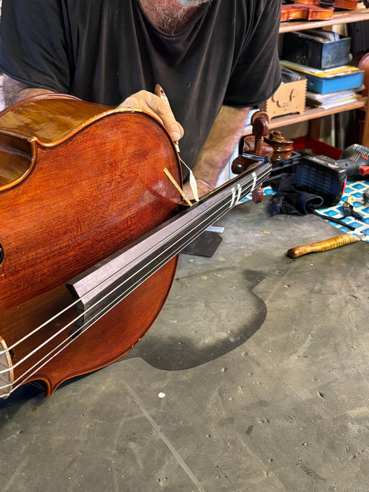 Cello Repair on the fretboard