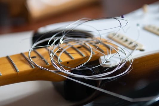 Electric Guitar Restringing
