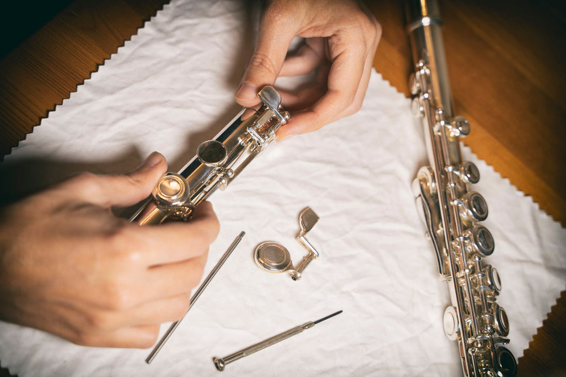 flute repair close up with key off