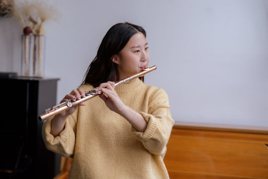 Girl Playing the flute