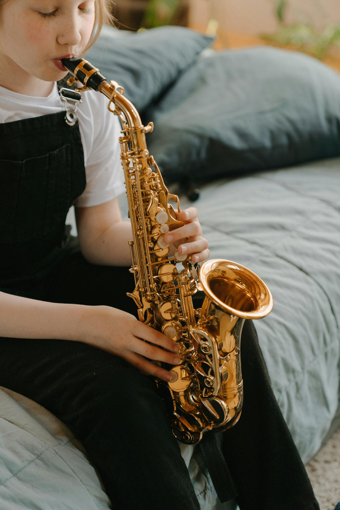 Girl Playing a saxophone