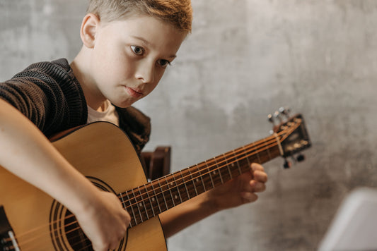 Boy playing guitar