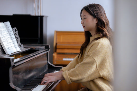 Teen Girl playing piano