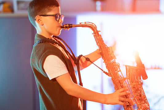 Sax boy rocking out on the instrument