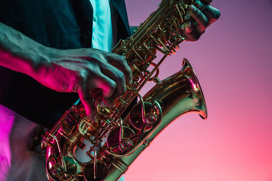Saxophone up close with lighted background