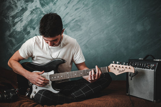 Teen Boy playing Electric Guitar