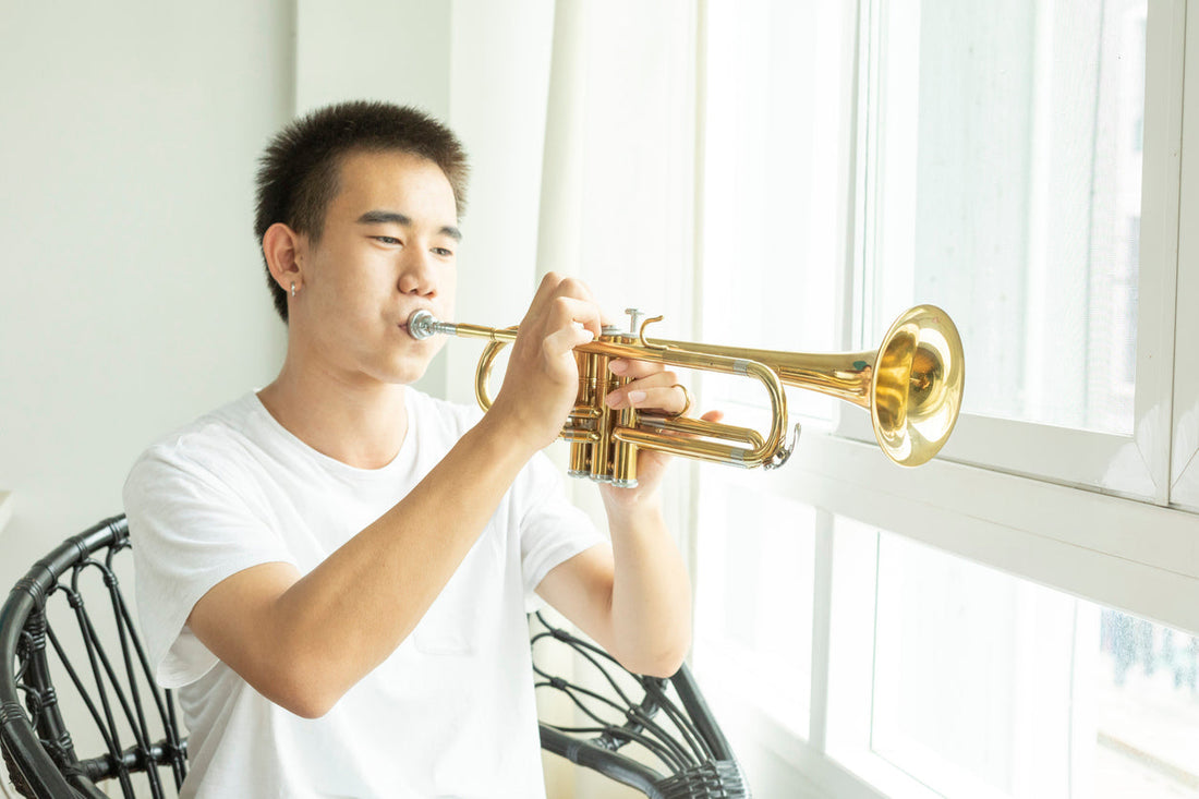 Teen Playing Trumpet