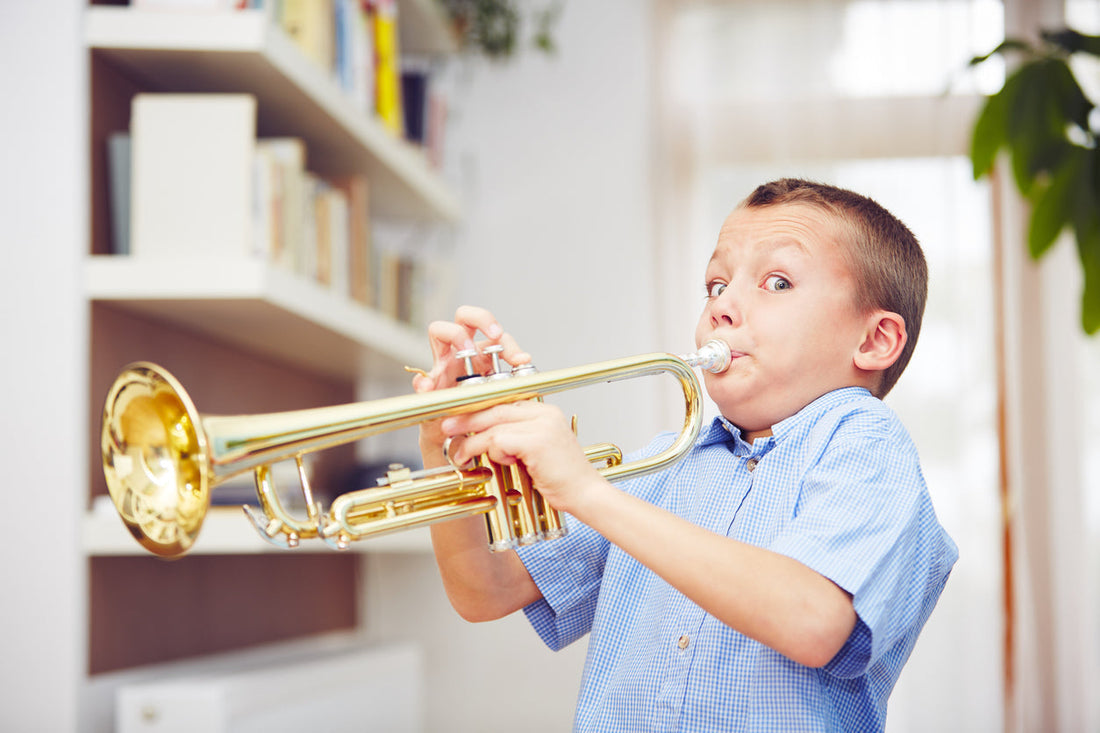 Trumpet boy making a funny face