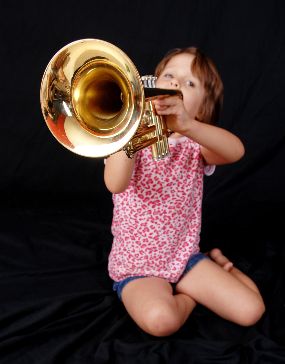 Child Playing Trumpet