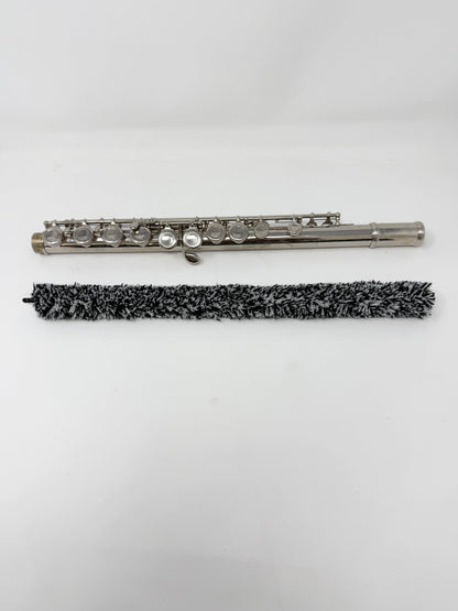 Close-up of a flute pad saver