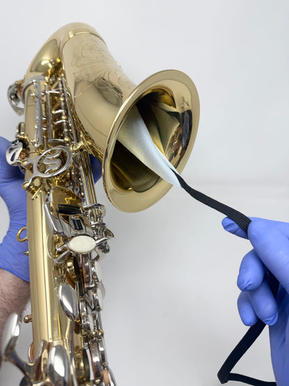 Weighted-end large saxophone swab after use