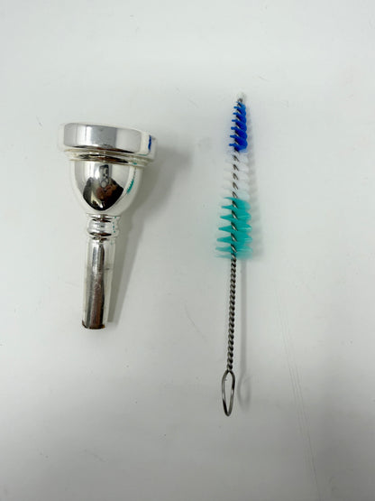 Conical brush for cleaning a trombone mouthpiece