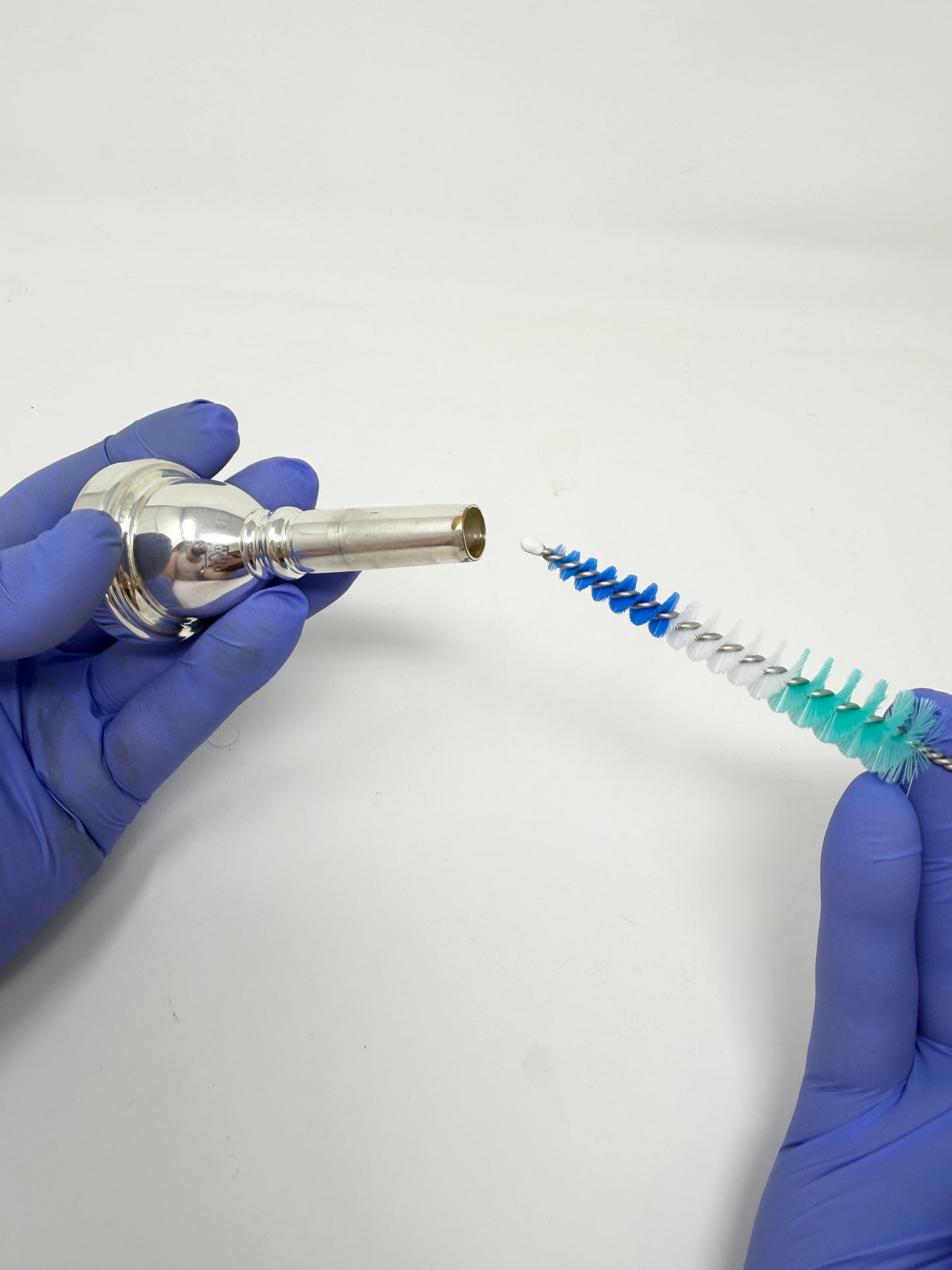 Conical brush for cleaning a trombone mouthpiece, alternate view