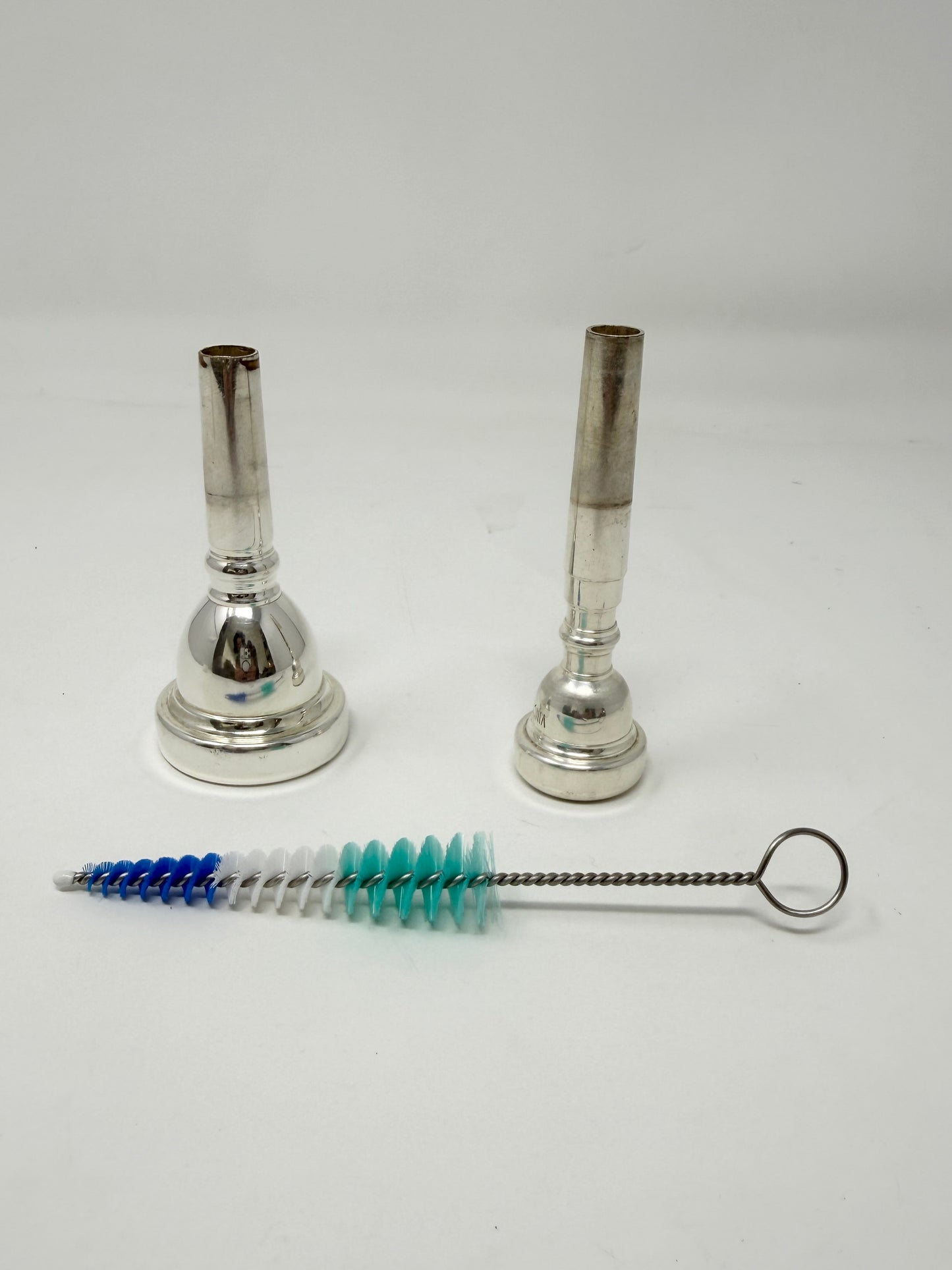 Conical brush for cleaning trombone and trumpet mouthpieces